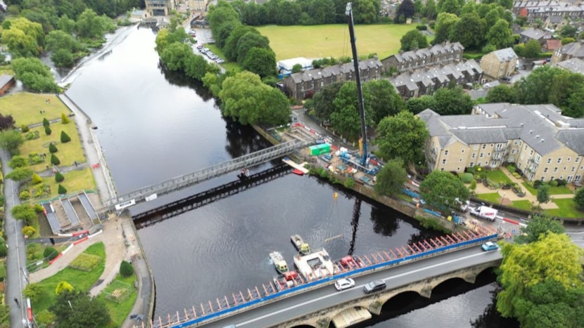 Steelwork installation gets underway on Otley Bridge replacement footway: Crane used in Otley footbridge demolition