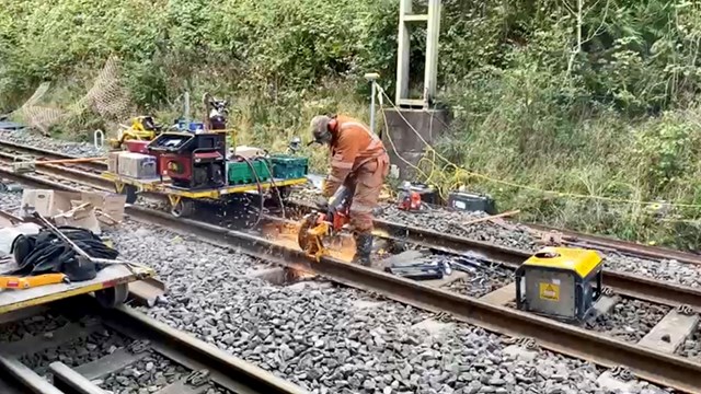 Angle grinding through rail during Beechwood Tunnel track replacement Oct 2022