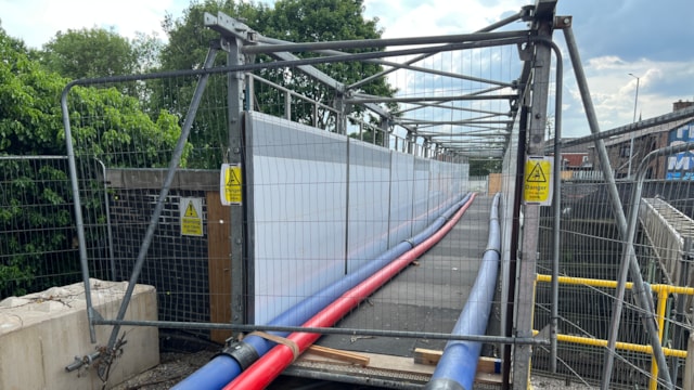 Statutory services diverted over the scaffold bridge: Statutory services diverted over the scaffold bridge