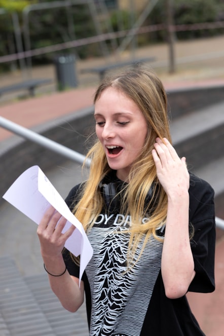 Emily celebrates her GCSE results at City of London Academy Highbury Grove
