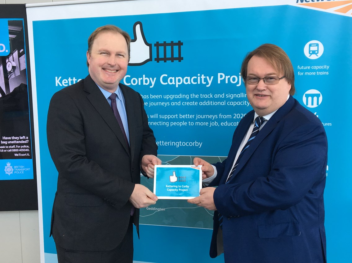 Commission accomplished! Extra rail line between Kettering and Corby enters into use: Left to right: Jake Kelly, Managing Director at East Midlands Trains and Spencer Gibbens, Principal Programme Sponsor at Network Rail