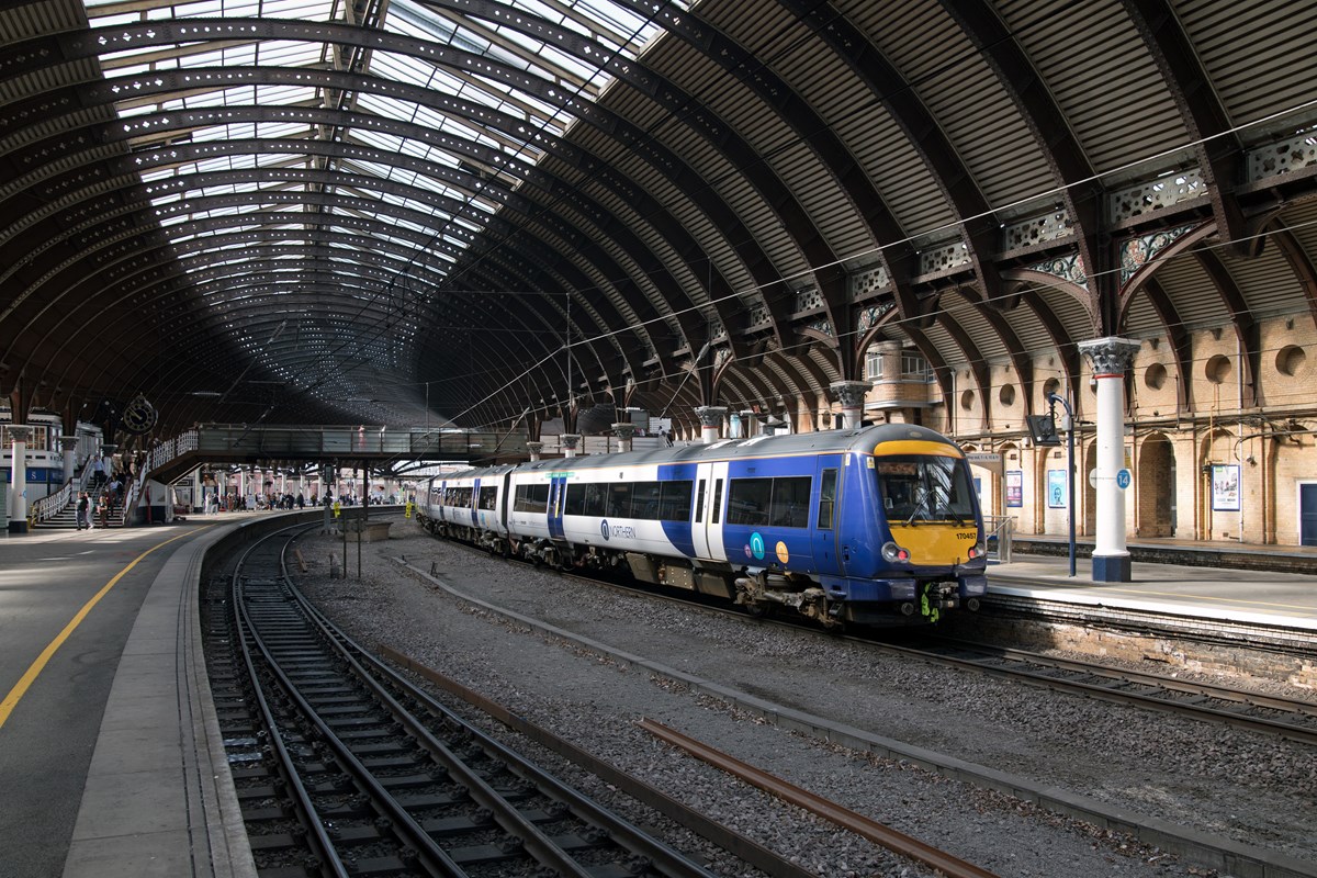 This image shows a Northern train waiting at York station