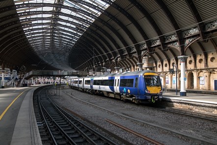 This image shows a Northern train waiting at York station
