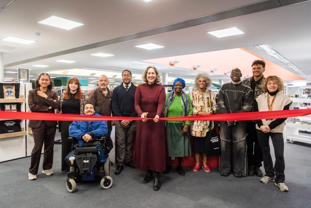 Mayor of Hackney, Caroline Woodley, cutting the ribbon for the reopening of Hackney Central Library (credit Hackney Council and Sean Pollock)