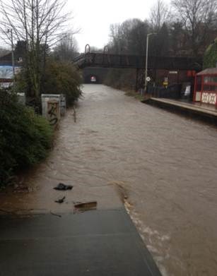 Walsden station under several feet of water