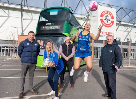 Caitlin Beevers (left) and Rhea Dixon with Dan Busfield, Franchise Director of Rhinos Netball, Ross Johnstone of First Bus and Gary Hetherington, CEO of Leeds Rhinos 2