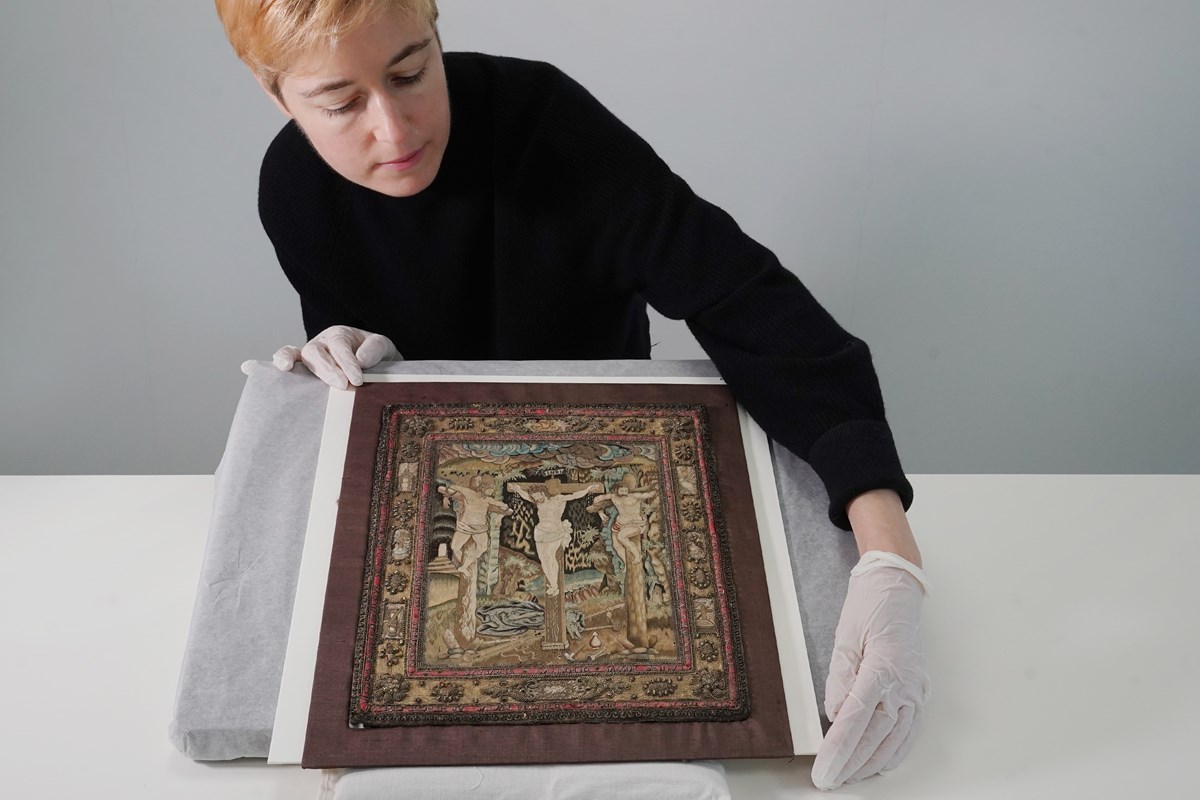Helen Wyld, Senior Curator of Historic Textiles at National Museums Scotland, with the 17th century embroidery. Photo © Stewart Attwood (2)