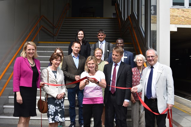 Network Rail's route managing director, Becky Lumlock (far left), and Network Rail's Chairman, Sir Peter Hendy (far right) were joined by MP for Putney Justine Greening (centre), Baroness Valentine (centre, second row) and representatives from Wandsworth Borough Council, South West Trains and local residents to mark the completion of £12 million of investment at Putney station