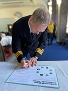 Commander Harrington, HM Naval Base Portsmouth, Royal Navy: Commander Harrington signing the Portsmouth Green Partnership Charter