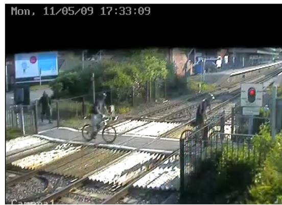 Cyclists ignore warning lights at Wareham level crossing, Dorset: Cyclists ignore warning lights at Wareham level crossing, Dorset