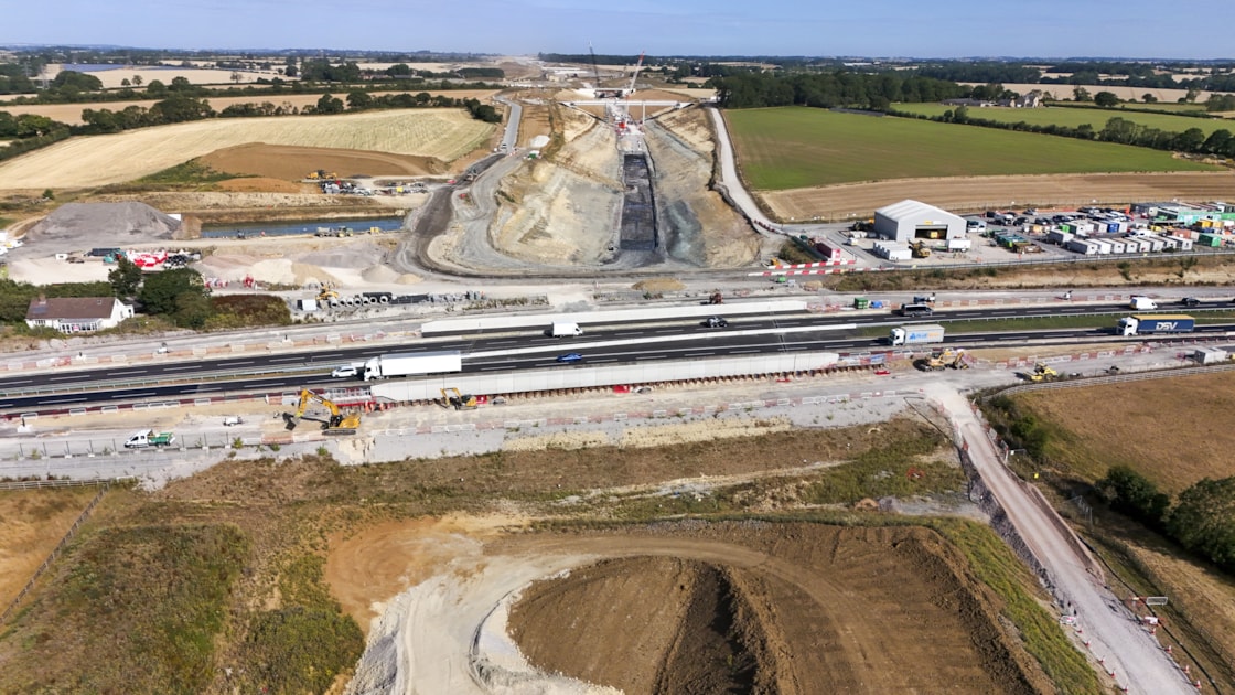 Traffic passing over HS2's A43 bridge near Brackley ahead of the excavation of the cutting that will allow trains to pass beneath July 2026