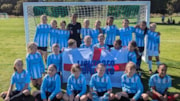 Surekha Griffiths, FA Grassroots Official of the Year 2023, with a team from the Regent’s Park Girls League: Surekha Griffiths, FA Grassroots Official of the Year 2023, with a team from the Regent’s Park Girls League