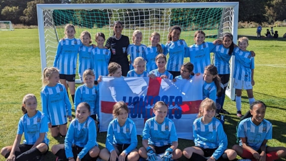 UPDATED - TfL celebrates the launch of the London Overground Lioness line, as a former England player surprises the future generation of women's football: Surekha Griffiths, FA Grassroots Official of the Year 2023, with a team from the Regent’s Park Girls League