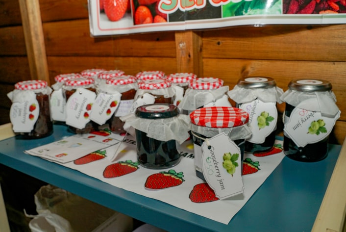 John Jamieson 4: John Jamieson School has an extensive array of new outdoor play and learning equipment. Pictured: Jams are among the produce created and sold by pupils in the new on-site shop.