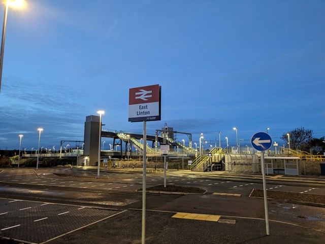 East Linton station sign and car park at night: East Linton station sign and car park at night