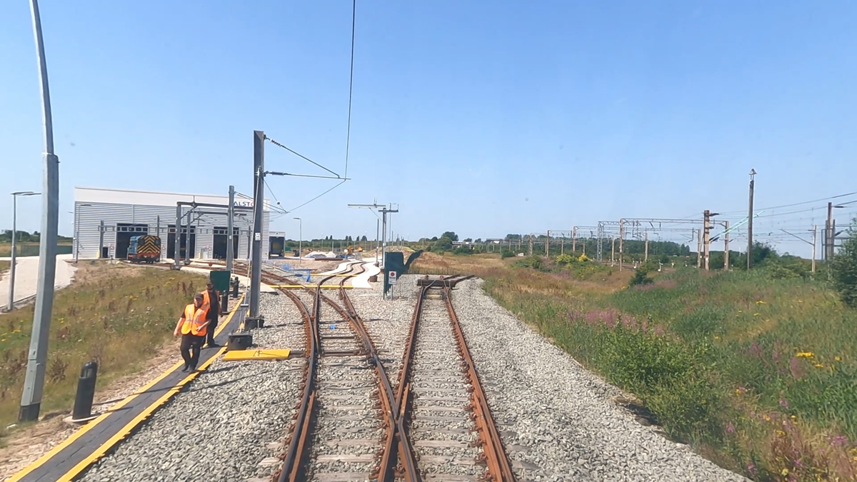 Alstom staff ready to bring in 390125 driver cab view