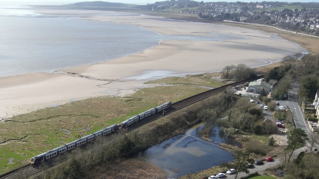 Passengers warned disruption between Lancaster and Barrow-in-Furness could last two weeks after train derailment: Aerial view of the location at Grange-over-Sands