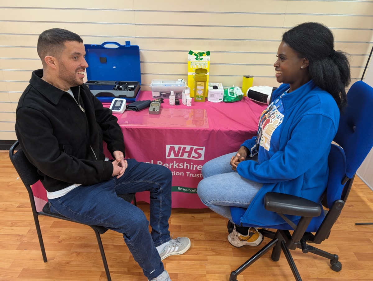 A free health check, Wassim and a Clinical Nurse from the Meet PEET team