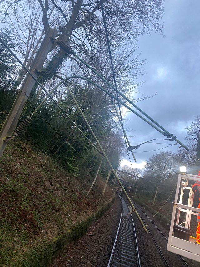 Twisted overhead line structure damaged by fallen tree at Styal-2