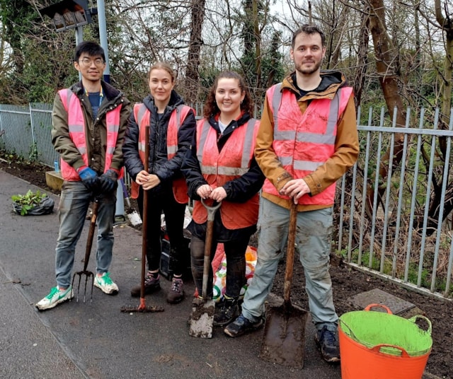SWR Sustainability team at Raynes Park station.: SWR Sustainability team completing biodiversity enhancement work at Raynes Park station.