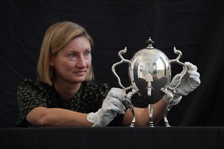 Curator Lyndsay McGill with an ovoid coffee pot, silver, by John Rollo, Edinburgh, 1735-6 002© Stewart Attwood