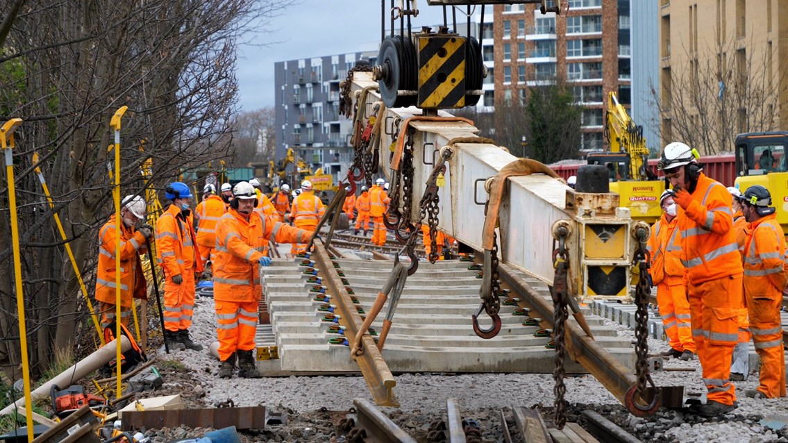 Why is London Euston station closed over the Easter bank holiday?: Library picture of track panel being laid during engineering work
