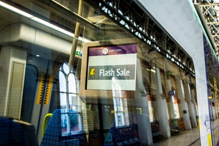 Image shows Flash Sale signage on-board Northern train