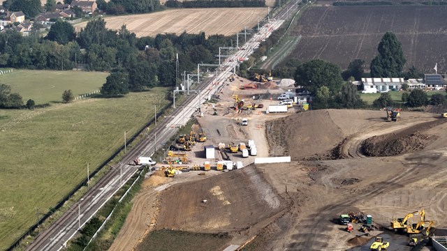 ‘Travel either side’ advice this Easter with Euston station closed: Aerial shot of new rail freight connection in Northampton