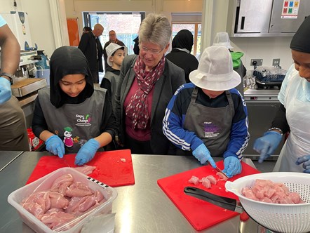 MSJ with children at a cookery lesson at Steps4Change