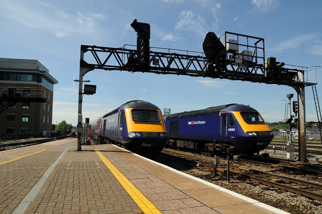 Passenger trains approaching Reading station: Improving the railway at Reading