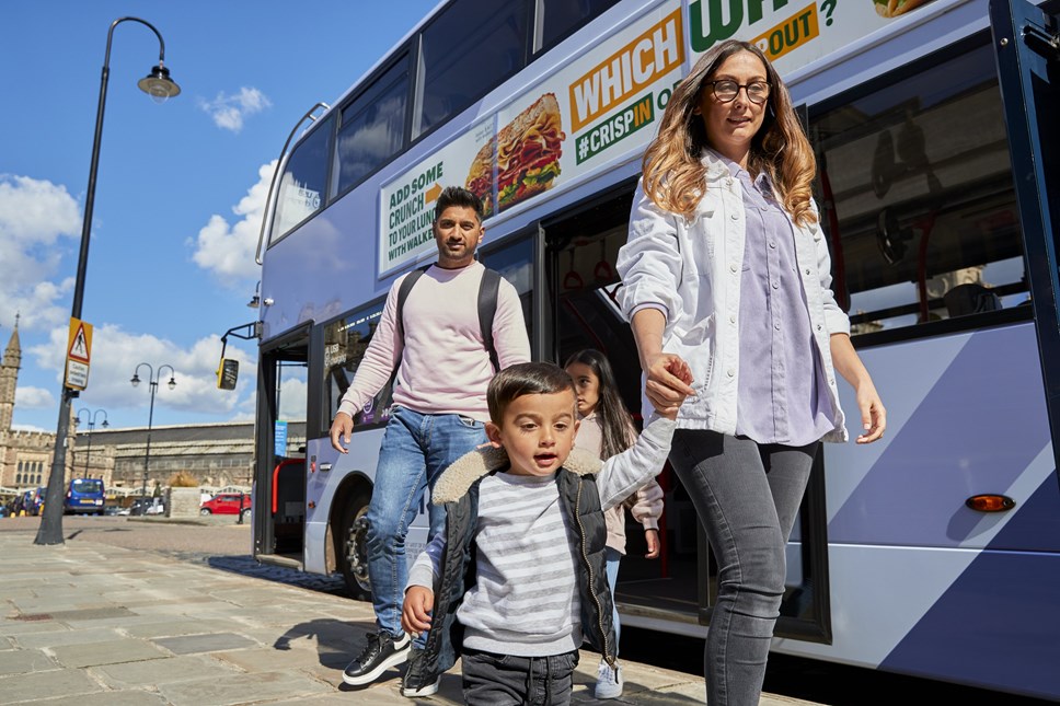 Family on a bus at Bristol Temple Meads
