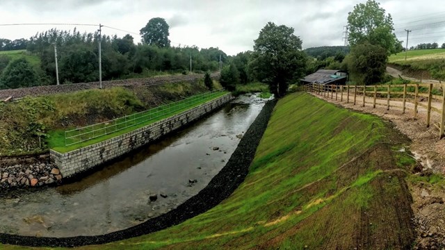 River protection work keeps West Coast main line passengers on the move: The River Leith beside the West Coast main line