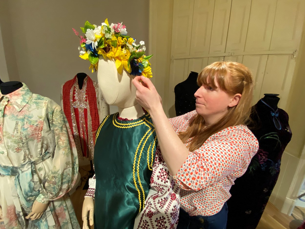 Ukrainian dress loan: Curator Natalie Raw works on the Ukrainian dress in the fashion gallery at Lotherton. From the central region of Ukraine, the costume consists of an embroidered shirt called a Vyshyvanka, which is worn along with a Vynok headdress and a sleeveless jacket called a Korstka.