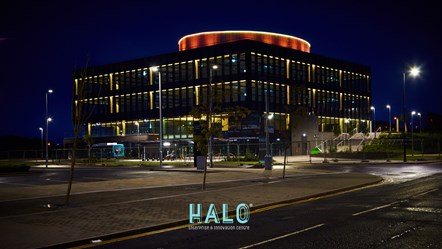Halo building lit up at night