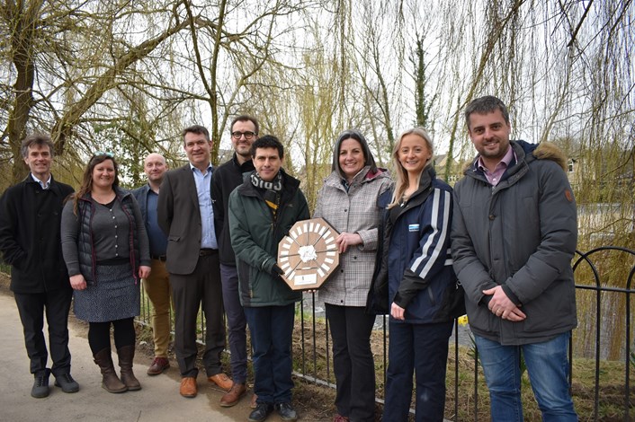 Otley FAS Smeaton Award Win: Councillor Helen Hayden, Leeds City Council’s executive member for infrastructure and climate, showcasing the ICE Yorkshire and Humber Smeaton award with representatives from Leeds City Council's Flood Risk Management Team, the Environment Agency, BAM Nuttall, Yorkshire Water, WSP and Alex Sobel MP.