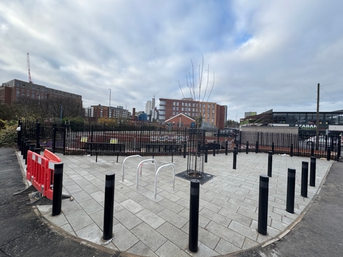 Sheepscar Beck - New public seating area on corner of Bristol Street and Cross Stamford Street: New public seating area on corner of Bristol Street and Cross Stamford Street with railings and bike storage