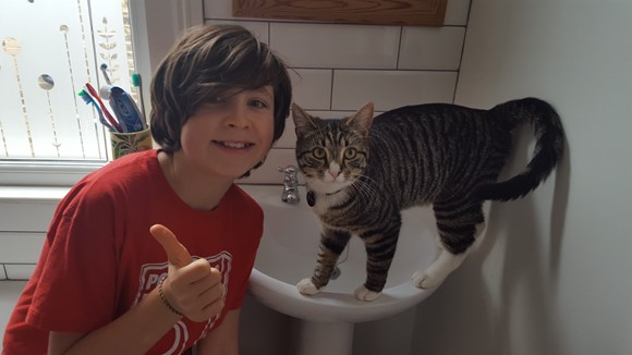 Boy and Cat in Bathroom