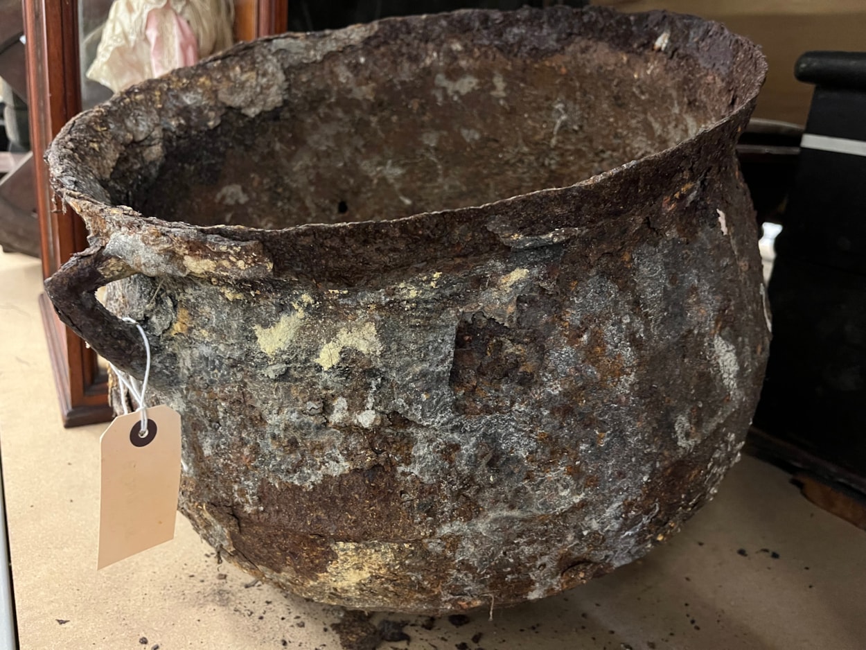 Cauldron: The cauldron was originally discovered in a cellar in Chapeltown in 2012 after workers came to investigate a peculiar dripping sound which the resident could not locate.
Removing a wall, they discovered what appeared to be a petrified object which was later identified as a metal cauldron, sealed behind the wall in what is believed to have been part of an ancient practice designed to protect the house and its residents from malign or supernatural forces.