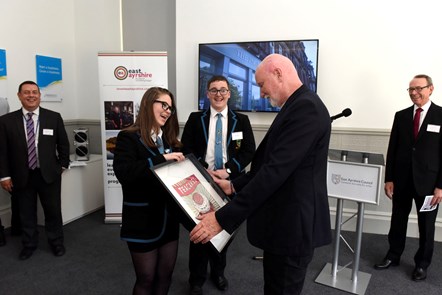 Sir Tom presented with gift by pupils from Doon Academy: Eilidh McHattie and Ryan Bartolo (Sir Tom Hunter enterprise challenge winners from Doon Academy) present Sir Tom with a gift painted by Erin Barr from Doon Academy