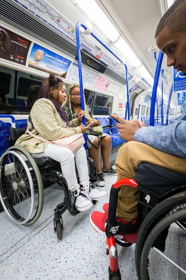 TfL Image - Wheelchair users travelling on the Tube