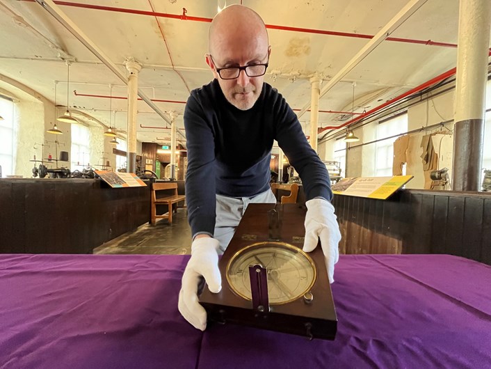 Engineery at Leeds Industrial Museum: Curator John McGoldrick with an antique surveyor’s compass, also known as the circumferentor, used to measure horizontal angles.
