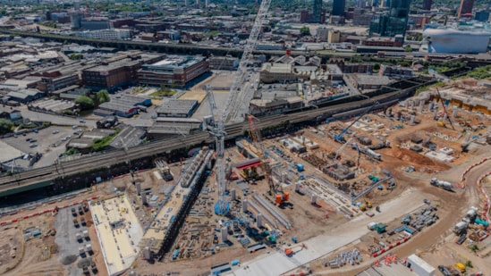View of the first U-beam being lifted onto an SPMT ahead of its installation at Curzon Street June 2026