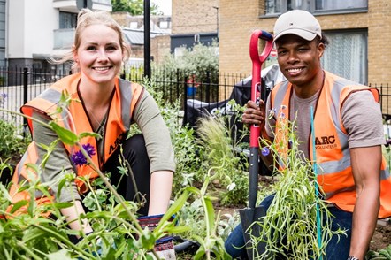 Two volunteers at a community planting session on the Packington Estate in May 2022