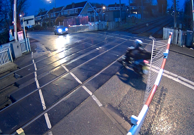 Shocking video shows kids on a moped swerving around level crossing barriers in Greater Manchester: Navigation Street level crossing missuse 4