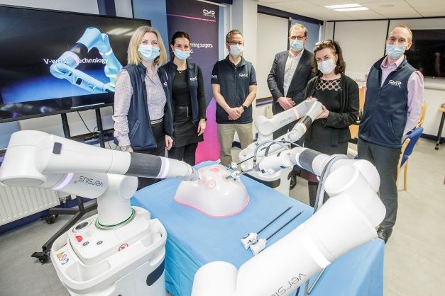 Pictured from L to R Ana Raduc, Georgia McAuliffe, Mike Yang, (all CMR Surgical) Jared Torkington (Cardiff and Vale University Health Board), Health Minister Eluned Morgan and Paul Roberts (CMR Surgical).