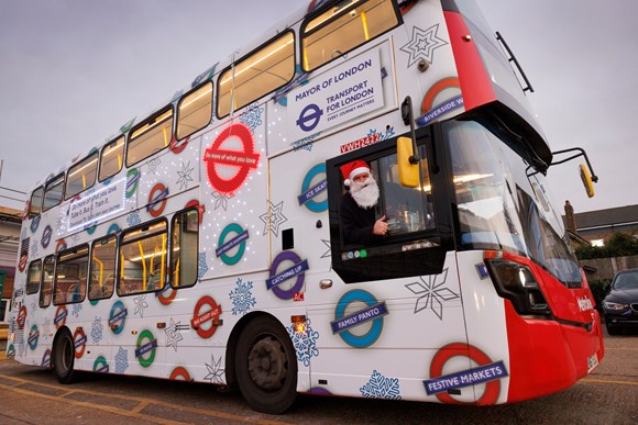 TfL Press Release - Hop on board TfL buses this Christmas for all your shopping needs: TfL Image - Santa Claus onboard one of TfL's festive buses