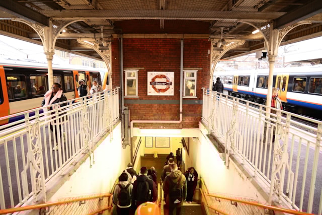 TfL Image - Weaver line roundel above the stairway at Hackney Downs station