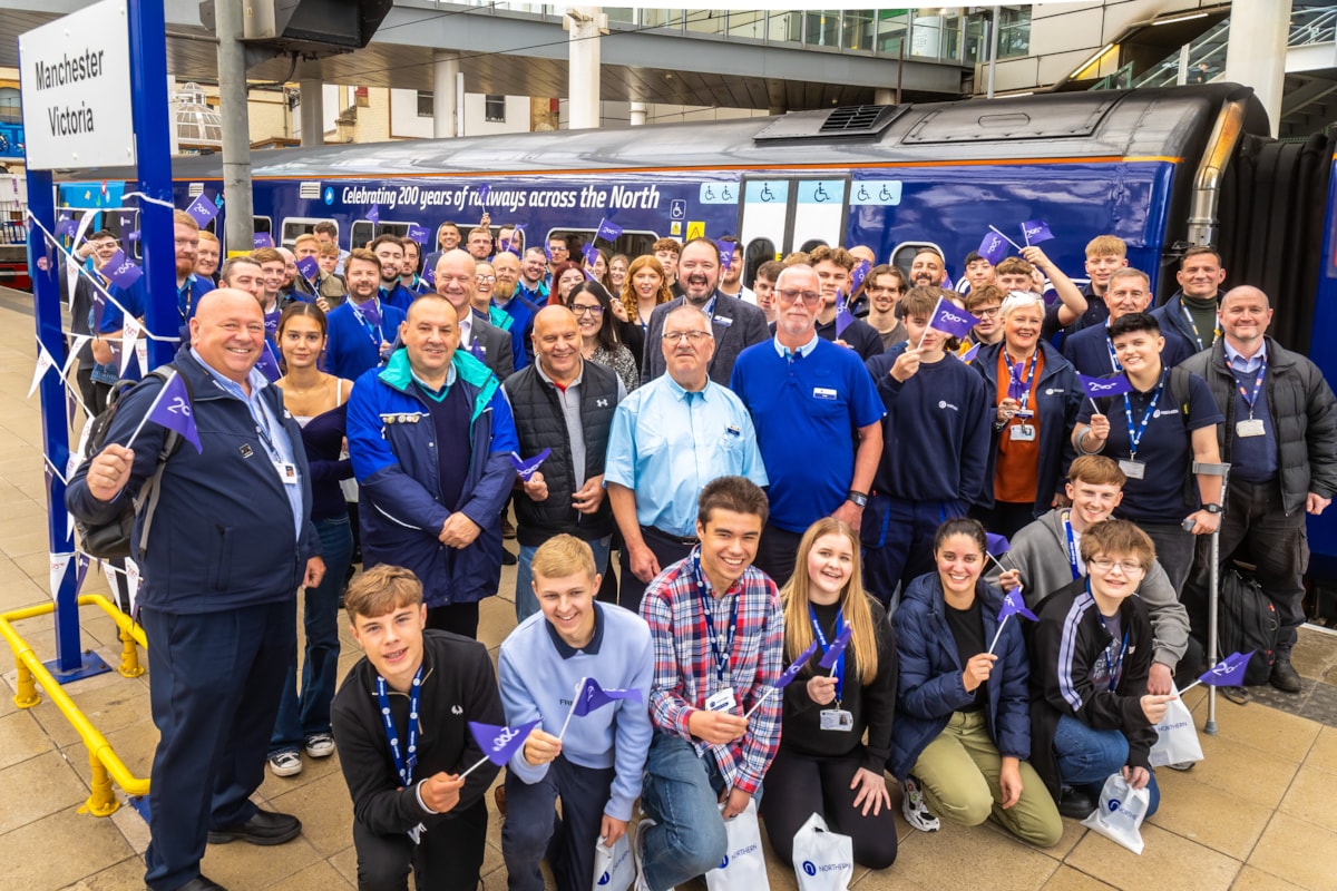 Northern colleagues celebrate the newly-launched Railway 200 train