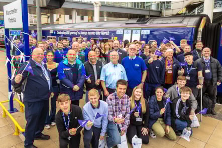 Northern colleagues celebrate the newly-launched Railway 200 train