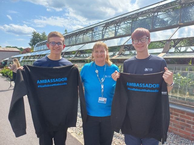 Young Leaders Archie Webster and Scott MacKay with Elizabeth MacDonald